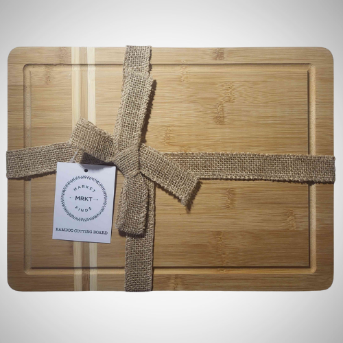 Market Finds Bamboo Cutting Board MEDIUM 12.5" x 9.5" x .6"      Care instructions:  Hand Wash thoroughly before and after use.  Avoid abrasive cleaners.  Do not use over open flame.  Avoid cross-contamination of all food prep equipment.  Do not soak in water or exposed to heat or sunlight.  Wash with running water and dry after use.  Not for use in a microwave or dishwasher. 