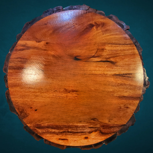 Round Wood Cutting Board with Tree bark and legs,14" diameter     Care instructions:  Hand Wash thoroughly before and after use.  Avoid abrasive cleaners.  Do not use over open flame.  Avoid cross-contamination of all food prep equipment.  Do not soak in water or exposed to heat or sunlight.  Wash with running water and dry after use.  Not for use in a microwave or dishwasher. 